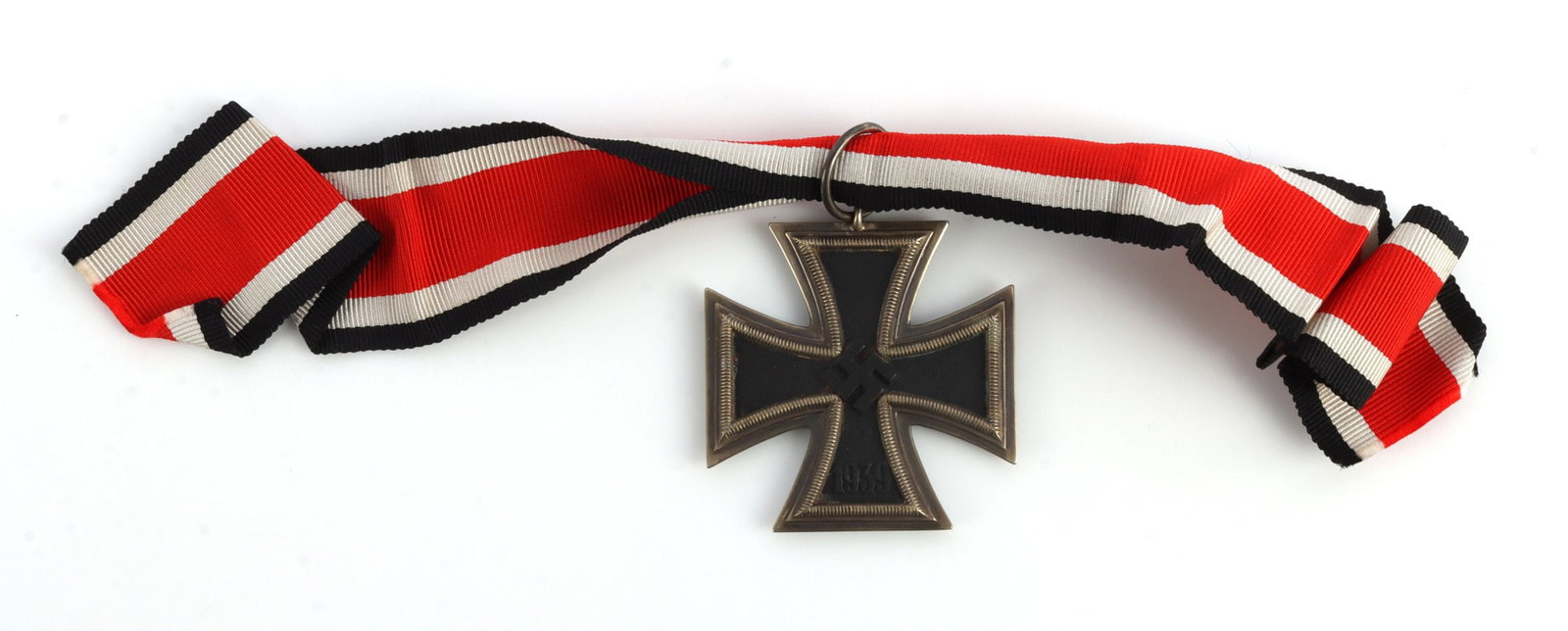 1939 IRON CROSS SECOND CLASS WWII GERMAN: Two piece silver frame with magnetic iron core. Ribbon ring is stamped L/15 for Otto Schickle. It measures 1 3/4 inches. Very good condition. This lot has a reserve.