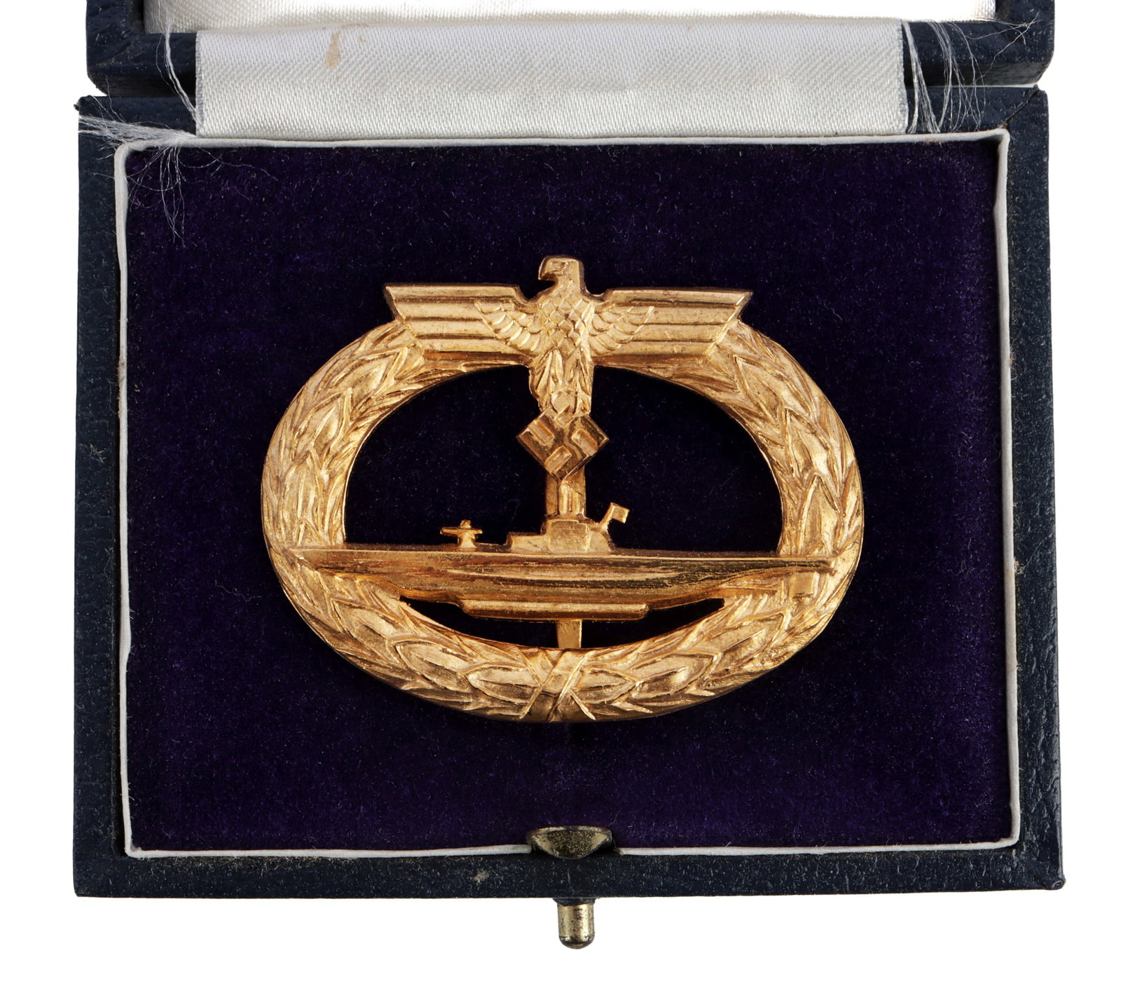 KRIEGSMARINE U-BOAT BADGE WWII GERMAN: Unmarked type with eagle. Near mint condition. It measures 1 7/8 inches. Comes in fitted case. This lot has a reserve.