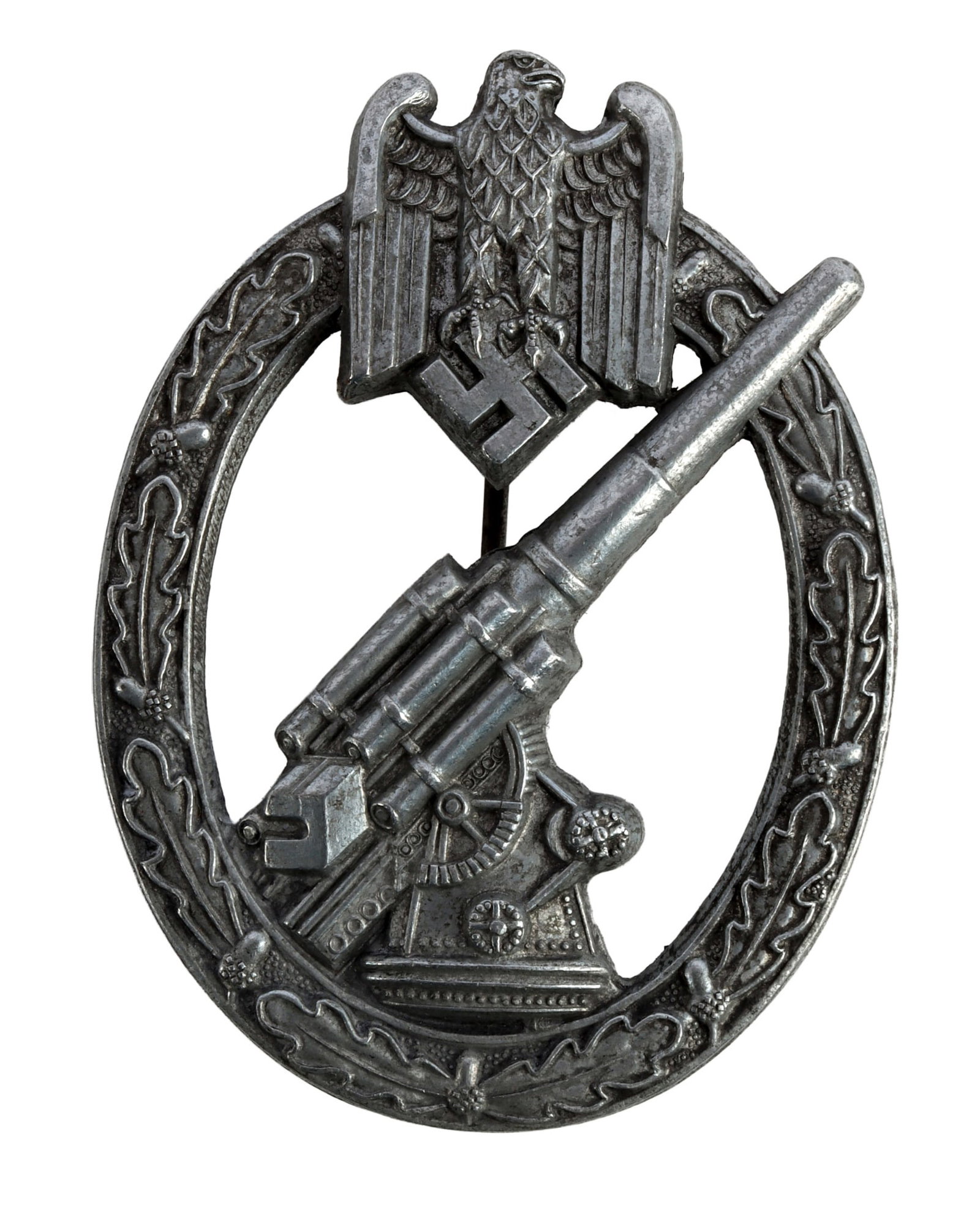 WWII GERMAN ARMY ARTILLERY BADGE IN ZINC: Mid war zinc construction. Ball and hinge type pin. Hermann Aurich make. It measures 2 1/4 inches. This lot has a reserve.