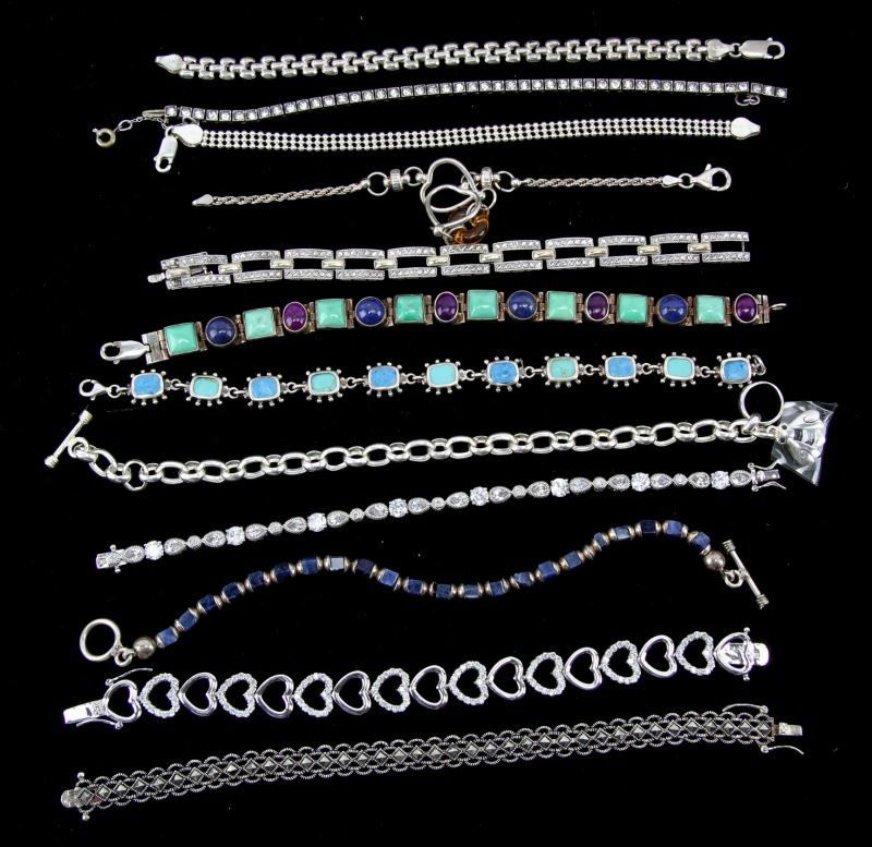 SMALL LOT LADIES STERLING LINK BRACELETS: Twelve pieces total; all flexible link design, including stones such as turquoise, lapis, amber, hemitite, CZ, etc..