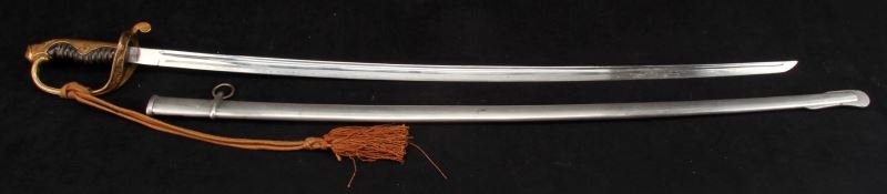 JAPANESE ARMY NCO PARADE SWORD WITH KNOT: Standard issue Imperial Japanese non-commissioned officer?s parade sword with sword knot and nickel-plated scabbard. Some finish loss to the chrome-plated blade and wear to the scabbard. Overall in ve