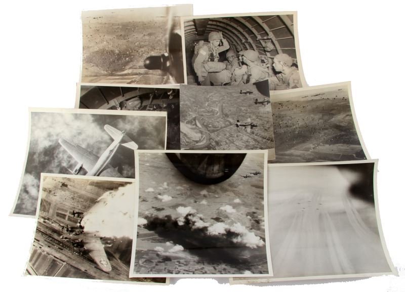 9 WWII AIR MINISTRY COPYRIGHT PARATROOPER PHOTOS: Two of the photographs are of US soldiers inside the plane right before they jump. Then there are two photographs of hundreds of paratroopers parachuting (from an aerial view). There are also five pho