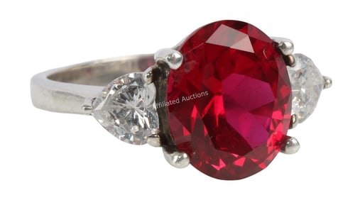 .925 SILVER RING WITH RED GEMSTONE