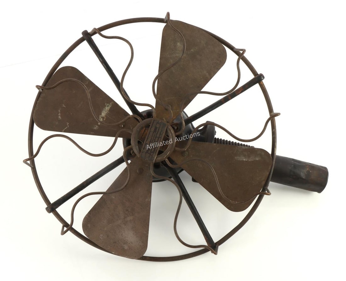 LAKE BREEZE MOTOR FAN HEAT POWERED WILLIAM STRONG: A Lake Breeze motor fan by William Strong. These are heat powered devices. 12 inch diameter blade, sits approximately twenty inches tall. Very good, original condition.