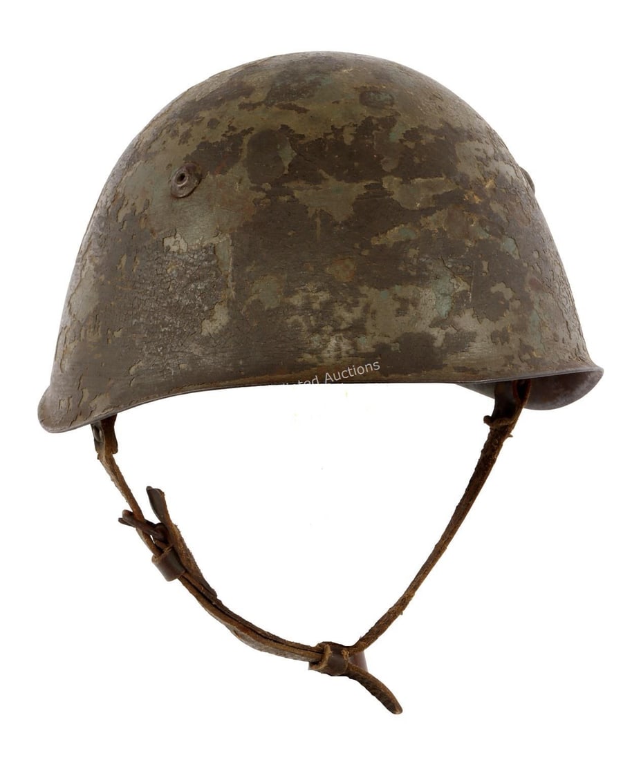 WWII ITALIAN M33 STEEL COMBAT HELMET: Complete, with original liner and chinstrap. Liner has size mark "58." Interior of helmet stamped "B 120" at neck. Very good condition.
