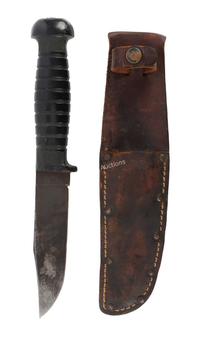US NAVY MARK I FIGHTING KNIFE W/ SHEATH: Colonial USN Fighting Knife. Mark I Profile. Blade marked 'U.S.N'. 'COLONIAL PROV. R.I' on reverse. Complete with original USN leather sheath. Blade: 5 inches Knife: 10 inches. Good condition.