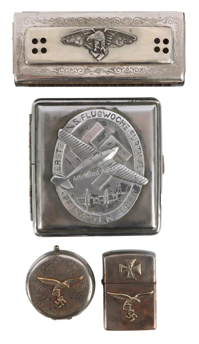 WWII GERMAN THIRD REICH PERSONAL EFFECTS LOT OF 4: Four personal items bearing the imagery of the Third Reich. 1) Luftwaffe personal ashtray. 2) Luftwaffe harmonica. 3) Luftwaffe lighter. 4) 1933 Flight Week cigarette case. Unauthenticated, sold as is