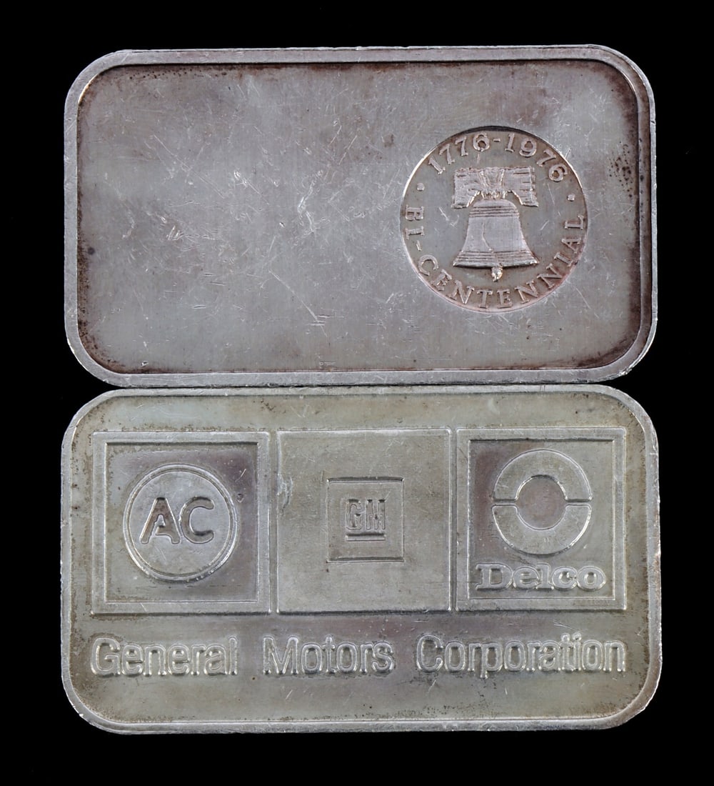 TWO 1 OZT .999 SILVER BULLION BAR MIXED DESIGN: Two ounces of silver over two bullion bars. Mixed design. Some toning. This lot reserved at melt.