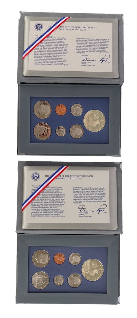 US SILVER DOLLAR 1986 PRESTIGE SET LOT OF 2: Brilliant uncirculated, mint state with a certificate of authenticity. This lot reserved at melt.
