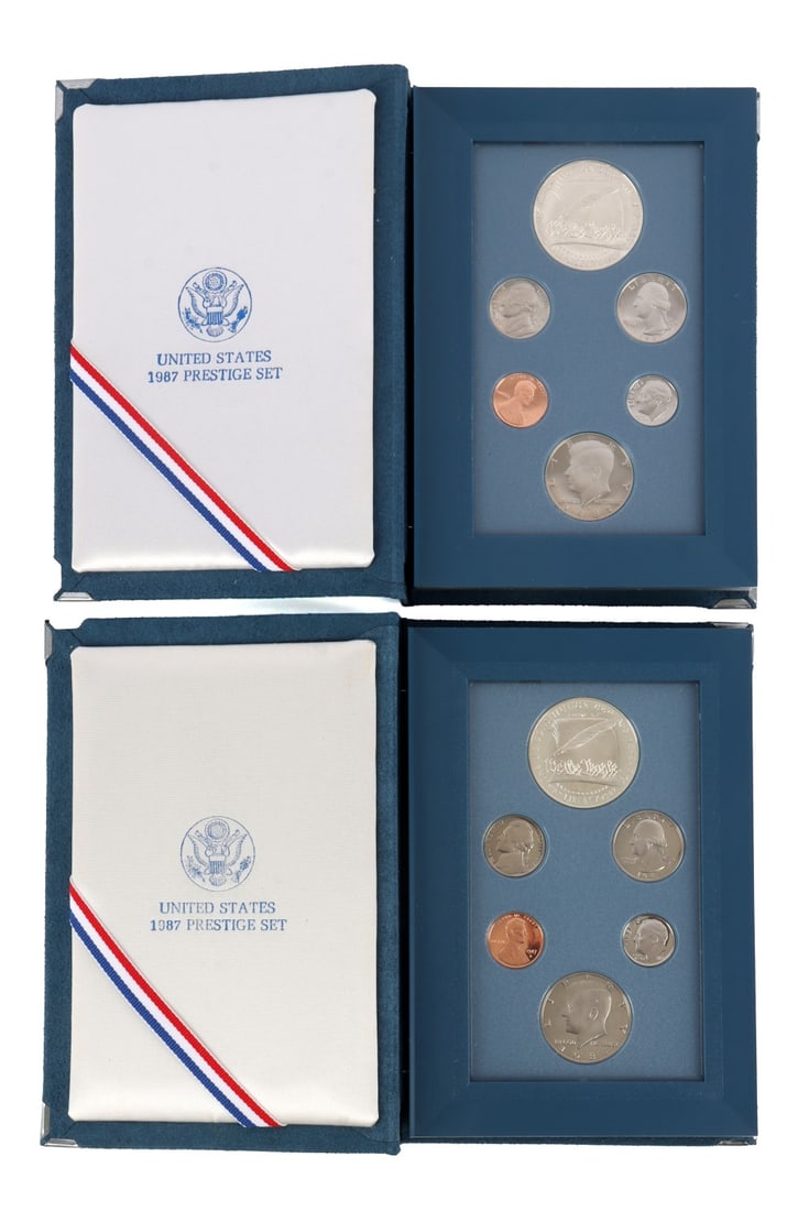 US SILVER DOLLAR 1987 PRESTIGE SET LOT OF 2: Brilliant uncirculated, mint state with a certificate of authenticity. This lot reserved at melt.