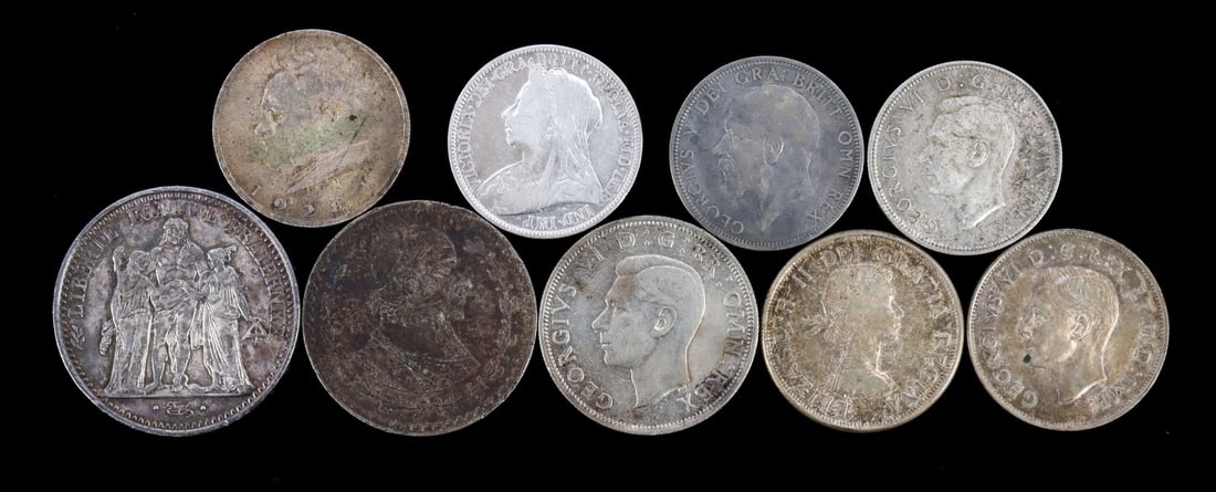 160 GRAMS OF INTERNATIONAL SILVER COINAGE: A selection of 160 grams of international silver currency. Various coins, various nations represented - mostly British commonwealth. This lot reserved at melt.