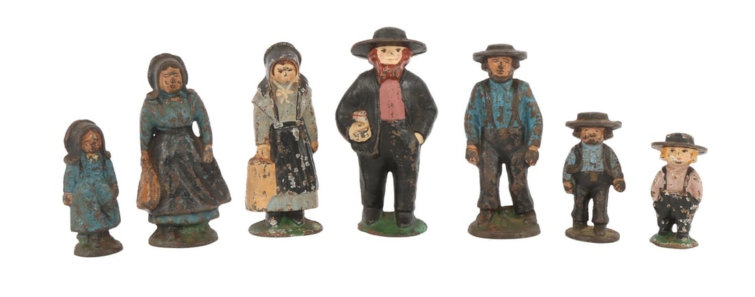 AMISH FAMILY CAST IRON FIGURINE LOT OF 7: Lot of seven (7) pieces. Painted cast iron figurines. Tallest measures 4.75 inches. Good condition.