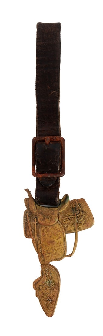 ANTIQUE SADDLE FOB HAMLEY & CO PENDLETON OREGON: An antique saddle fob made by Hamley & Co of Pendleton, Oregon Mounted on a leather strap, buckle on leather strap shows oxidation. The fob itself has strong features, but does show oxidation. Very go
