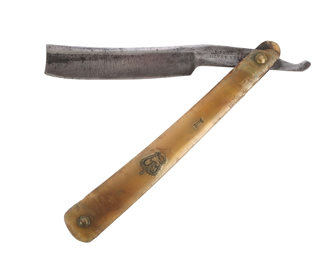 ANTIQUE STRAIGHT RAZOR I. PEARCE: An antique straight razor with an I Pearce Silver Steel maker's mark. Approximately 6 inches when folded.