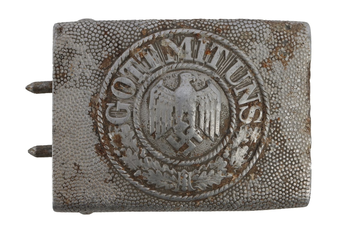 WWII GERMAN THIRD REICH HEER BELT BUCKLE: A belt buckle for the Heer of the German Third Reich. Bears a Reichsadler with a swastika and the slogan "Gott Mit Uns." Very good, original condition.