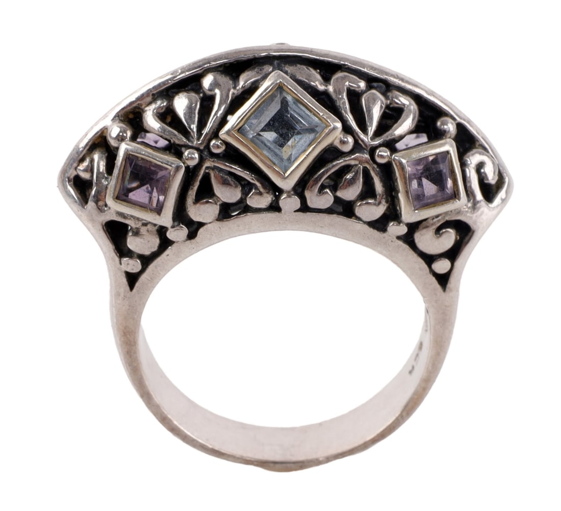 .925 STERLING SILVER FASHION RING AQUAMARINE: A .925 sterling fashion ring with six stones, two aquamarine and four amethyst. Size 8. Very good, original condition. This lot has a reserve.