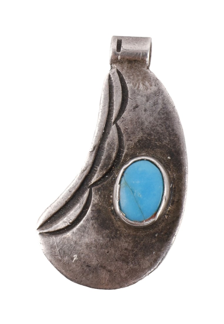 NAVAJO .925 SILVER PENDANT WITH TURQUOISE STONE: A Native American Navajo southwest .925 sterling silver pendant with a turquoise stone, likely Robin's Egg. Likely Old Pawn. Approximately 1 inch. Very good, original condition. This lot has a reserve