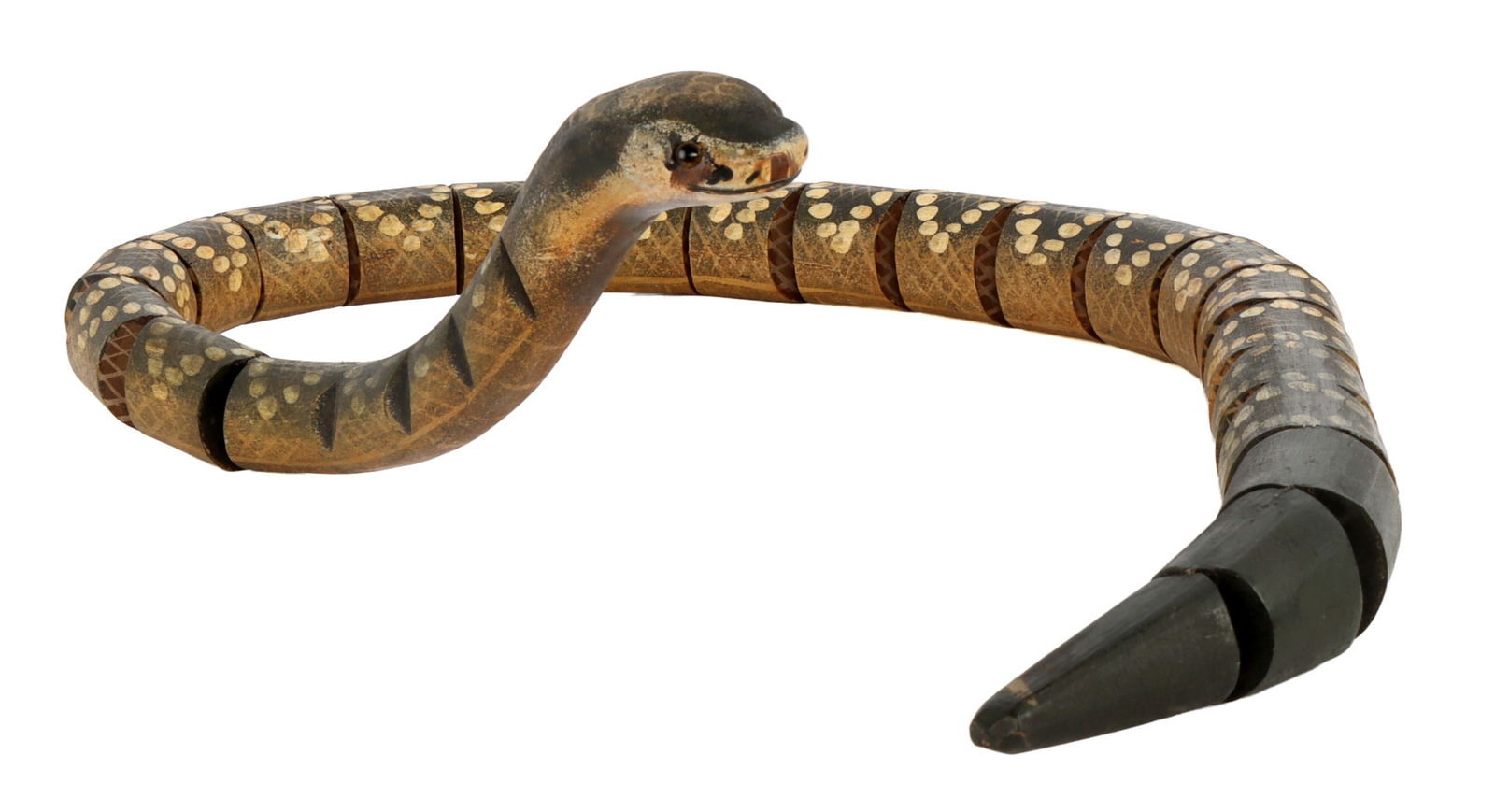 FOLK ART ARTICULATED DIAMONDBACK RATTLESNAKE: Americana folk art example of an articulated wooden cobra. A lifelike depiction. Length 33 inches. Very good, original condition.