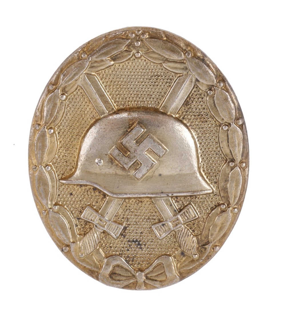 WWII GERMAN HEER WOUND BADGE IN GOLD L/14: Reverse marked "L/14" with vertical tapered pin. Very good condition.