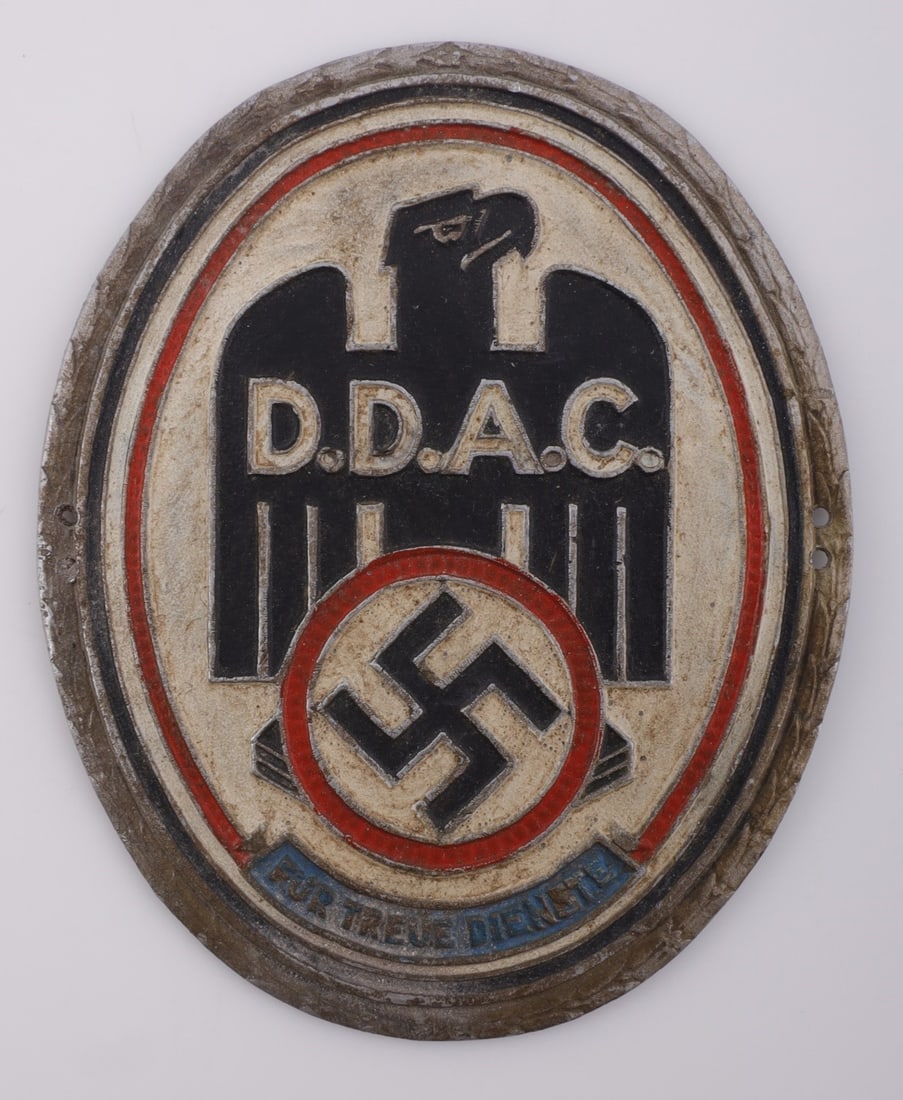 WWII GERMAN THIRD REICH DDAC PLAQUE: A plaque for the DDAC (Der Deutsche Automobil-Club). 2.5 X 3 inches. Tin. Very good, original condition.