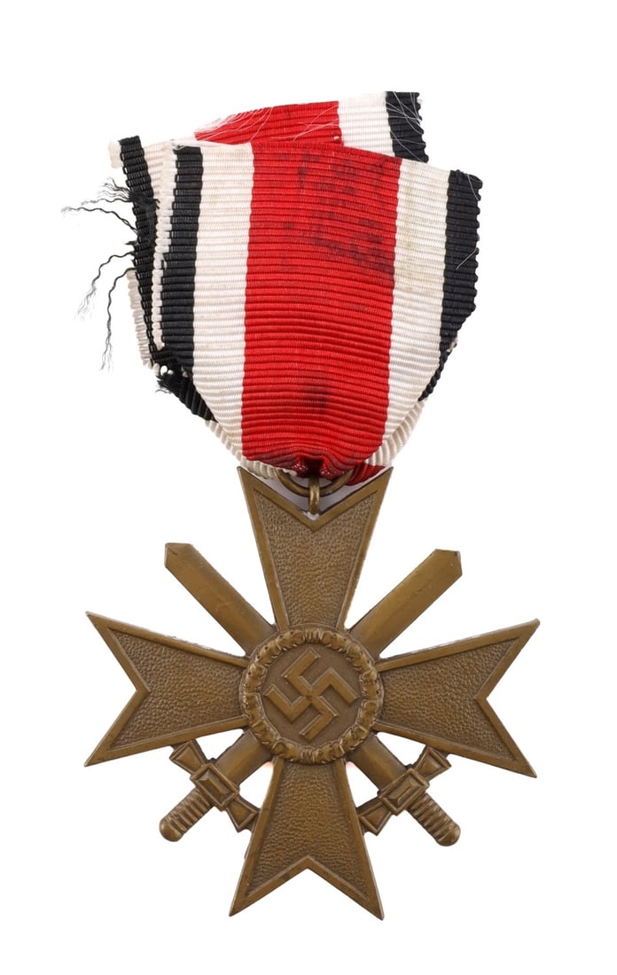 WWII GERMAN THIRD REICH WAR MERIT CROSS: A war merit cross with swords. 2.25 inch diameter. With red, black, and white ribbon, fluorescing. Unauthenticated, sold as is.