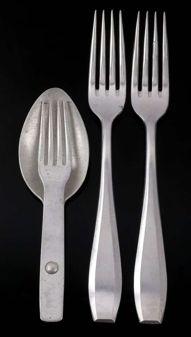 WWII GERMAN HEER MESS KIT UTENSILS LOT OF 3: Lot of three (3) pieces. Aluminum. Forks marked on reverse with Reichsadler over "W.S.M. 42." Combination fork/spoon marked "VDNS40." Very good condition.