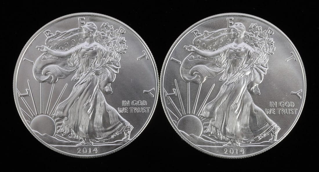 2 ONE TROY OUNCE .999 SILVER EAGLE 2014: .999 fine silver. Mint state. Brilliant uncirculated. Two coins total. This lot has a reserve.