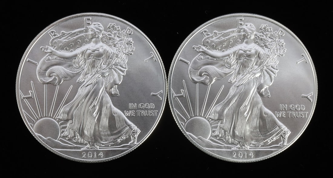 2 ONE TROY OUNCE .999 SILVER EAGLE 2014: .999 fine silver. Mint state. Brilliant uncirculated. Two coins total. This lot has a reserve.