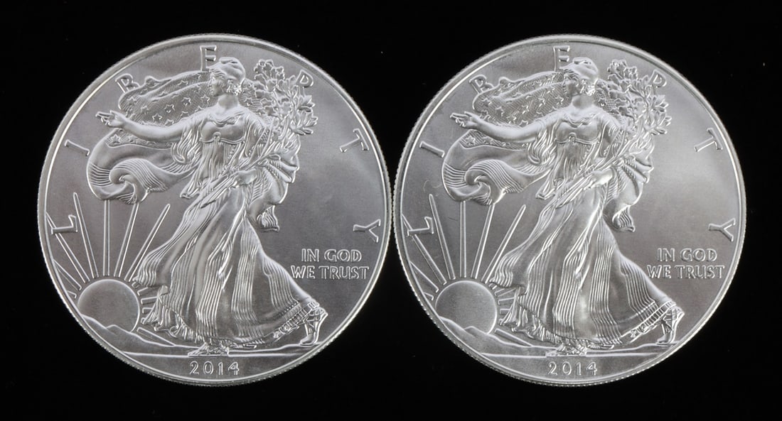 2 ONE TROY OUNCE .999 SILVER EAGLE 2014: .999 fine silver. Mint state. Brilliant uncirculated. Two coins total. This lot has a reserve.