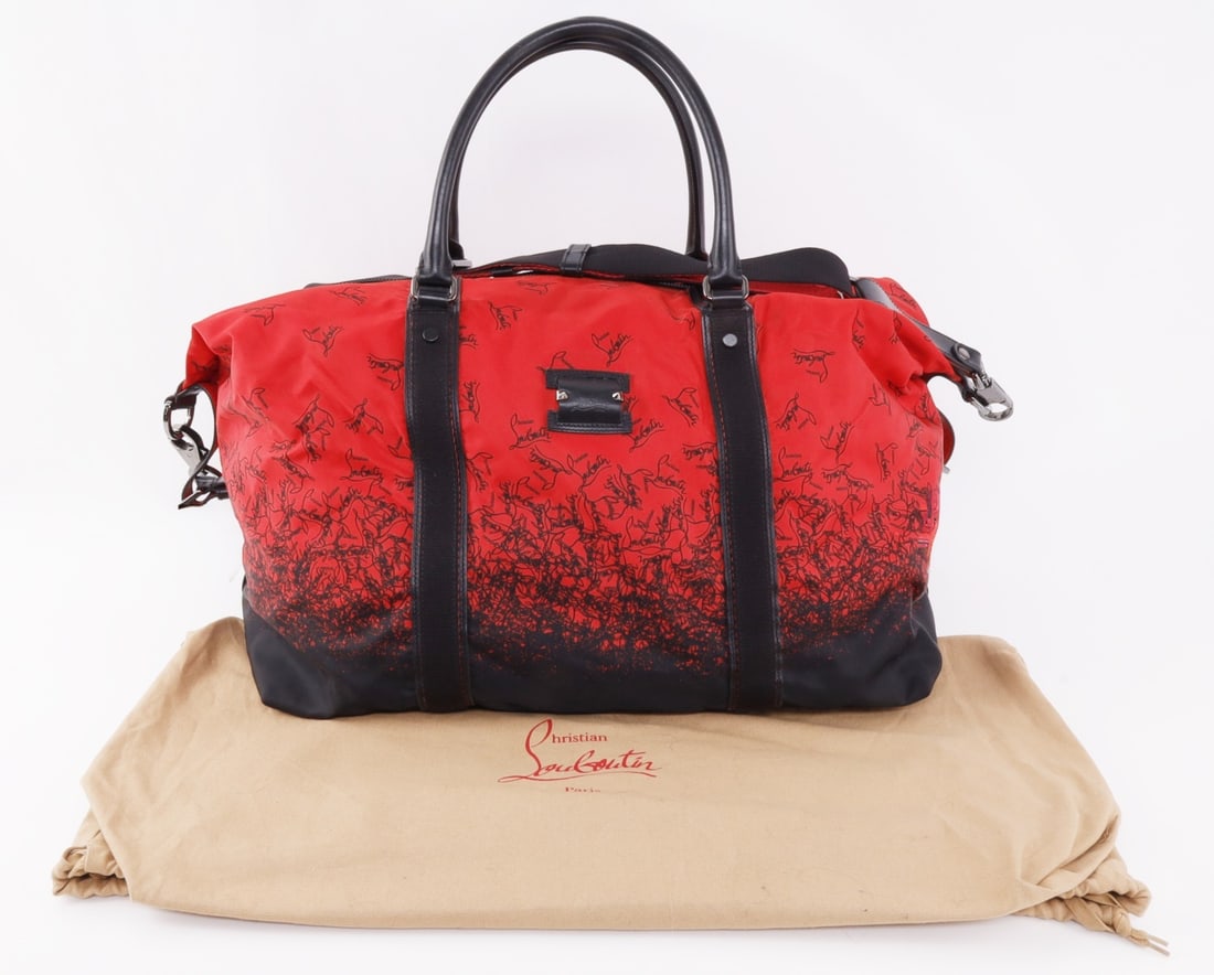 CHRISTIAN LOUBOUTIN NYLON DUFFLE PARISLISBOA: A 'Parislisboa' nylon duffle bag from Christian Louboutin, in red and black with overlapping logo design. Leather bottom. With original dust cover. 18 X 16 X 10 inches. Authenticity guaranteed. This l