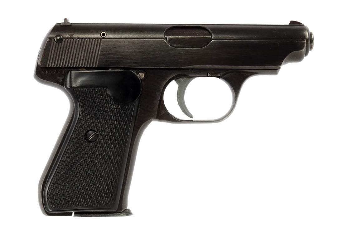 WWII GERMAN 'EAGLE/C' SAUER MODEL 38H .32 PISTOL: Sauer Model 38H semi-automatic pistol with holster and one (1) factory magazine. Left of trigger guard has eagle with swastika and "C" German police proof. Right of frame and slide marked with eagle o