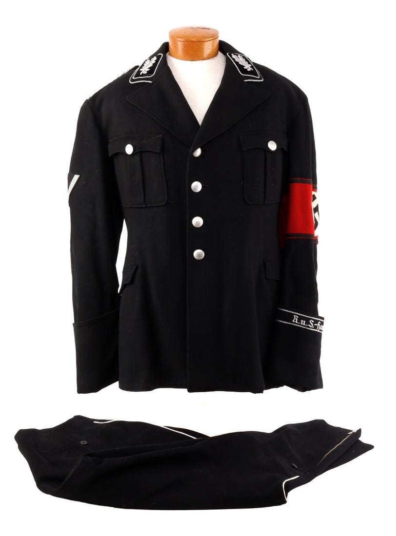 NAMED WWII GERMAN SS OBERFUHRER RUS TUNIC: Named SS Oberfuhrer RuS Tunic. This uniform ensemble, representative of the SS-Rasse- und Siedlungshauptamt (Race and Settlement Main Office), is executed in a fine gabardine wool. The tunic is charac