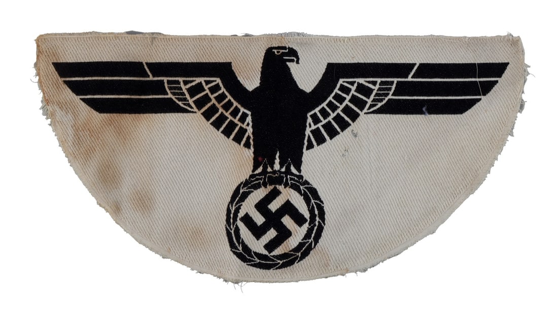 WWII GERMAN ARMY SPORTS SHIRT EAGLE: Cutaway from a Third Reich era tank top style sport shirt. It measures 9 7/8 inches. Non-fluorescing.