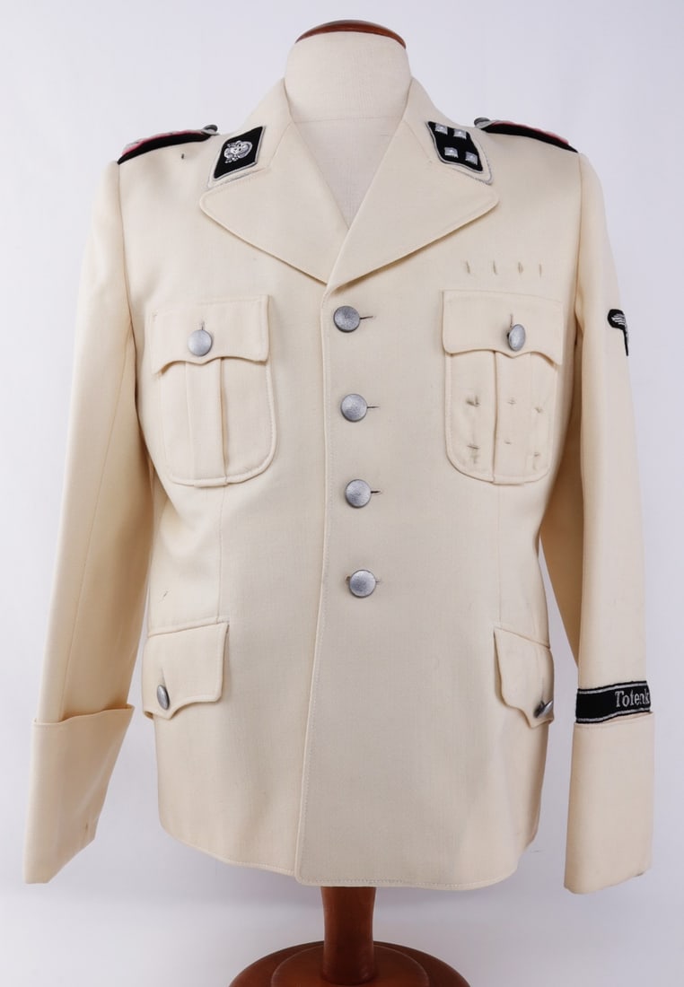 WWII GERMAN SS PANZER MAJOR SUMMER TUNIC: WWII German SS Panzer Major summer tunic. Features standard white gabardine cloth with shoulder boards, collar tabs, pebbled buttons, and silk liner. Bullion threading borders the collar. The Totenkop