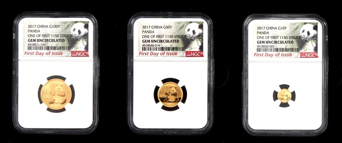 SET OF THREE 2017 .999 GOLD PANDA COINS: Three .999 panda yuan coins, in three separate denominations: 10 yuan, 50 yuan, and 100 yuan. All are gem uncirculated, and first 1150 strikes.12 grams of .999 gold total. Slabbed, graded, and inside