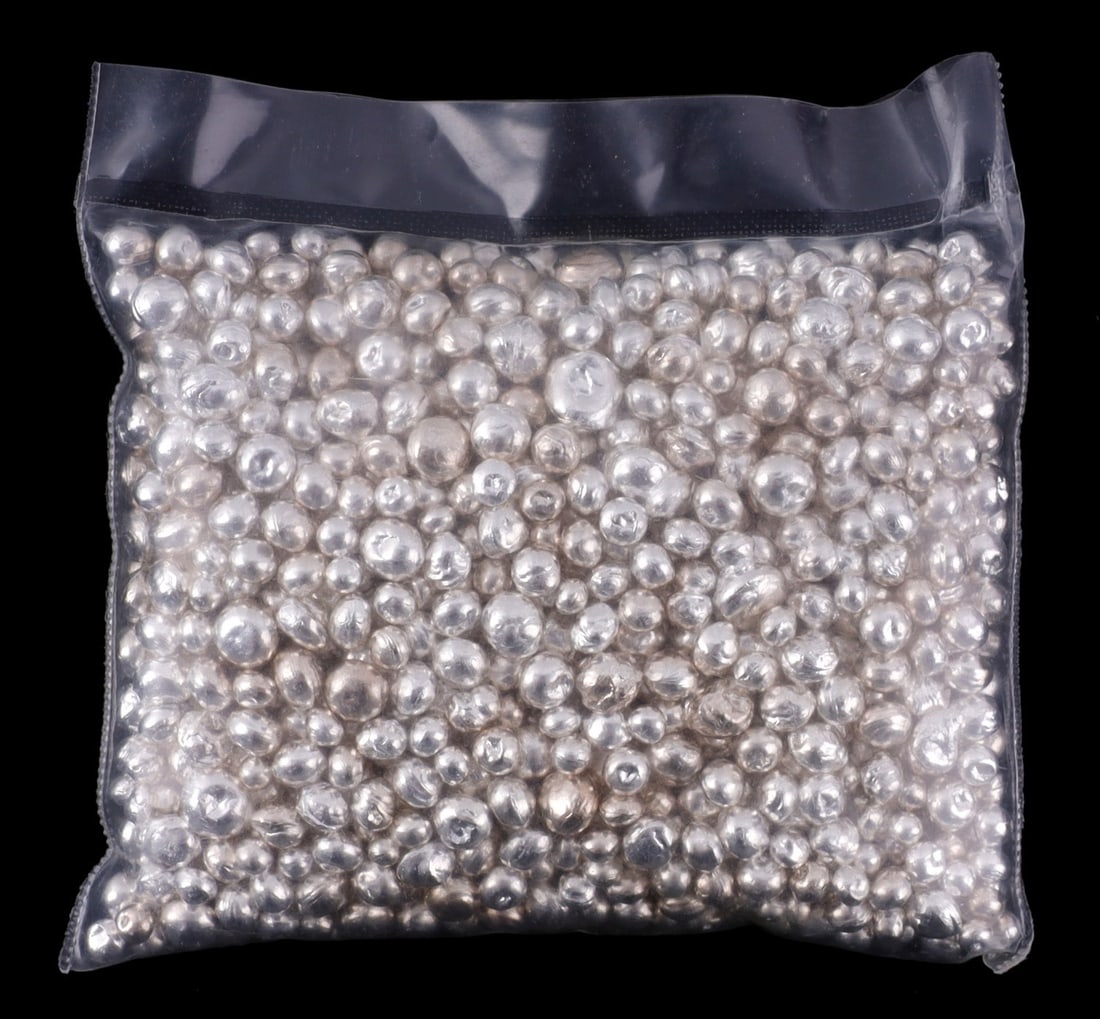 A BAG OF .999 FINE SILVER DROPLETS (1 of 2)