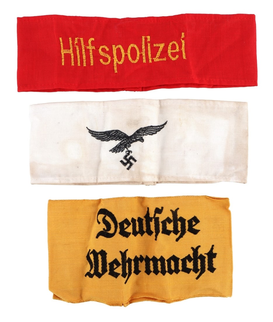 WWII GERMAN THIRD REICH ARMBANDS LOT OF 3: Three armbands for the German Third Reich. Hilfspolizei, Luftwaffe, and in Service of the Wehrmacht. These are modern historic interpreter's pieces.