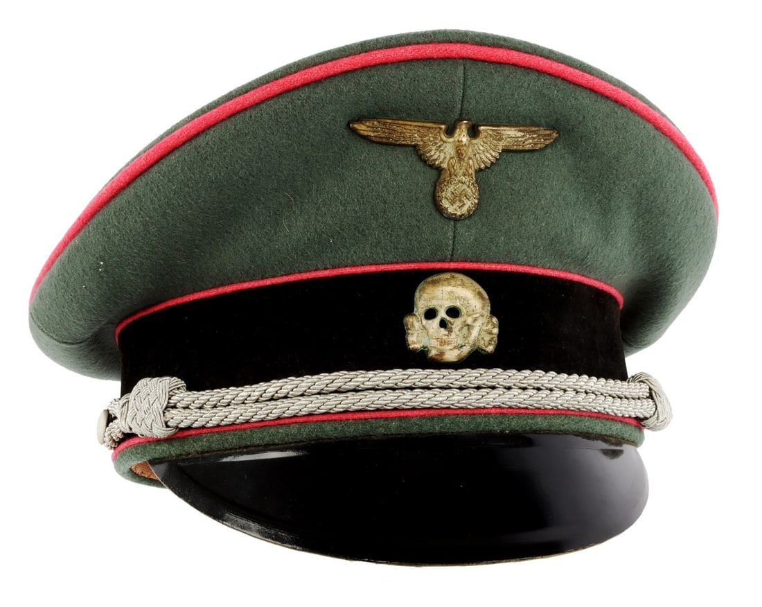 WWII GERMAN WAFFEN SS PANZER VISOR: Grey wool visor with pink piping. Reichsadler and Totenkopf are silver plated brass. Leather sweatband on interior as well as a silk liner. Large SS runes in hold under cellophane cover. Interior diam