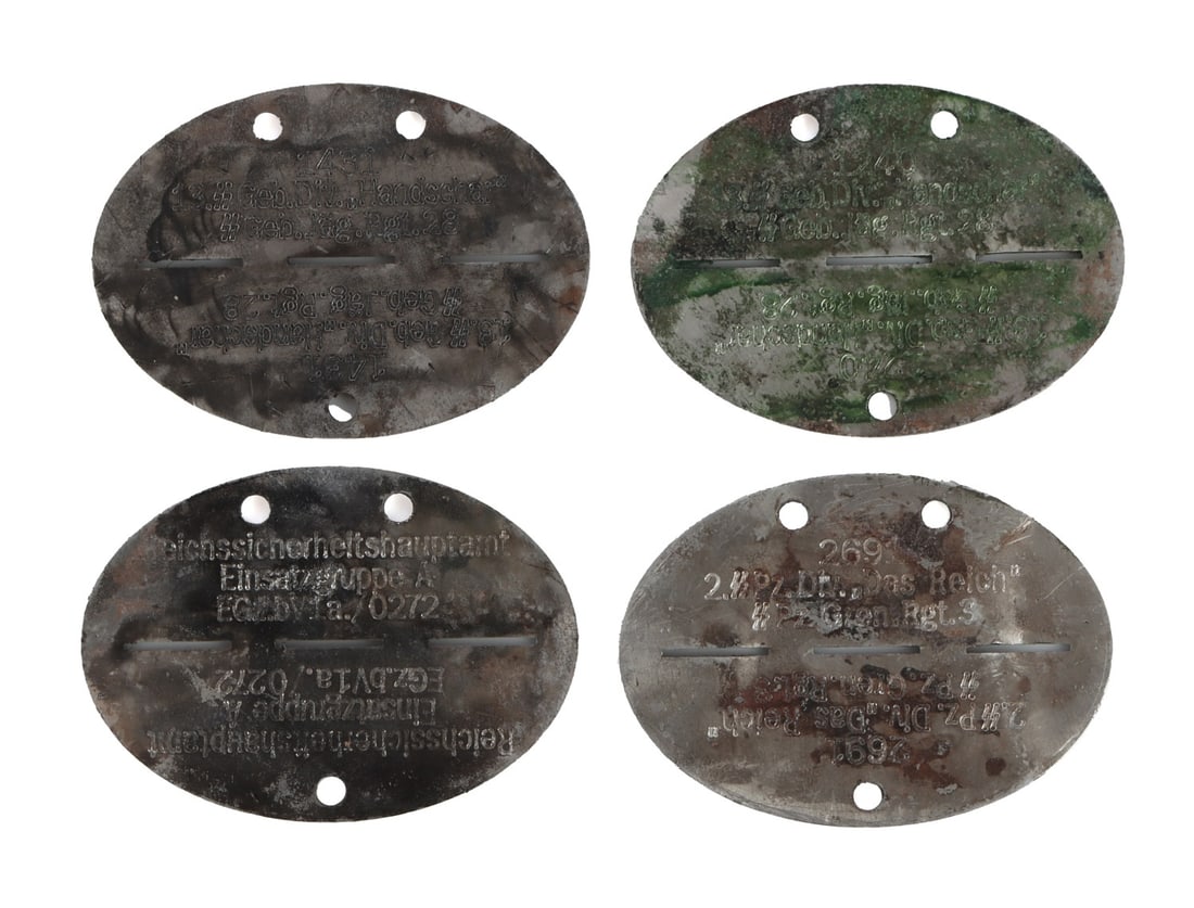 GERMAN REICH WAFFEN SS DOG TAGS LOT OF 4: Lot of FOUR (4) German Reich Dog Tags. TWO (2) Waffen SS Handschar Mountain Division. ONE (1) Reichssicherheitshauptamt Reich Security Office. ONE (1) Panzer Waffen SS Reich Division. Each measures 2.