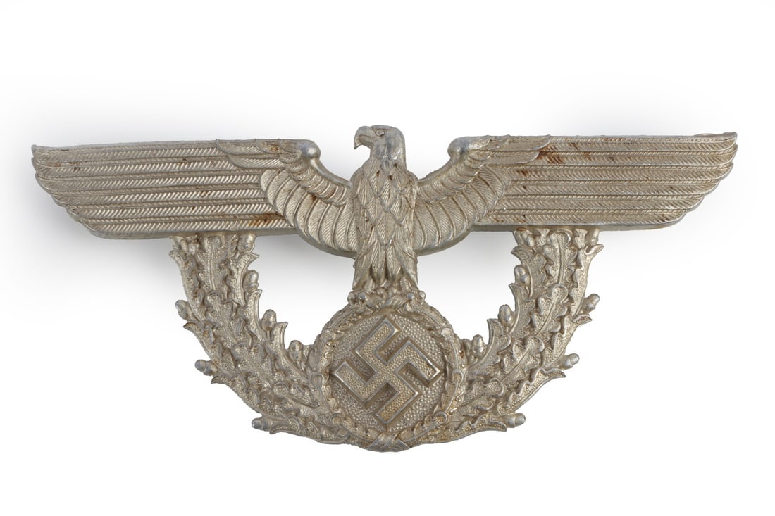 WWII GERMAN THIRD REICH POLICE SHAKO PLATE: Silver washed zinc or aluminum construction. It measures 6 1/4 inches.