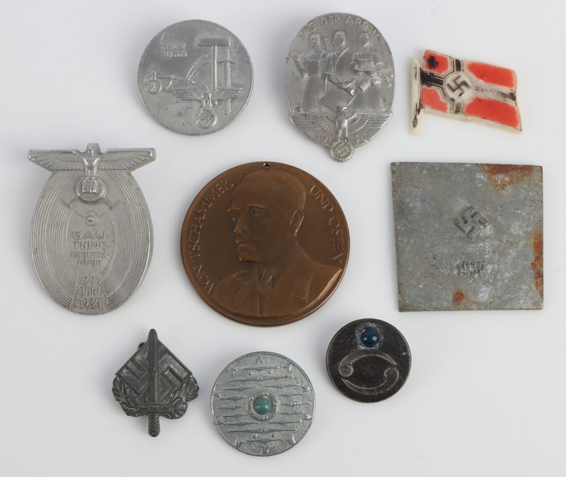 WWII GERMAN THIRD REICH TINNIE LOT OF 8: One Von Tschammer medallion and RAD workers tinnies.