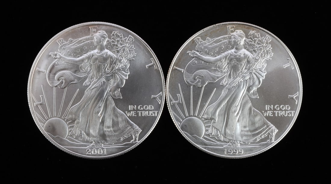 2 US SILVER AMERICAN EAGLES 1999 AND 2001: Brilliant uncirculated. This lot reserved at melt. || Payment & shipping: Accounts without purchase history must pay via Zelle, money order, cashier's check or wire transfer. Items will ship within