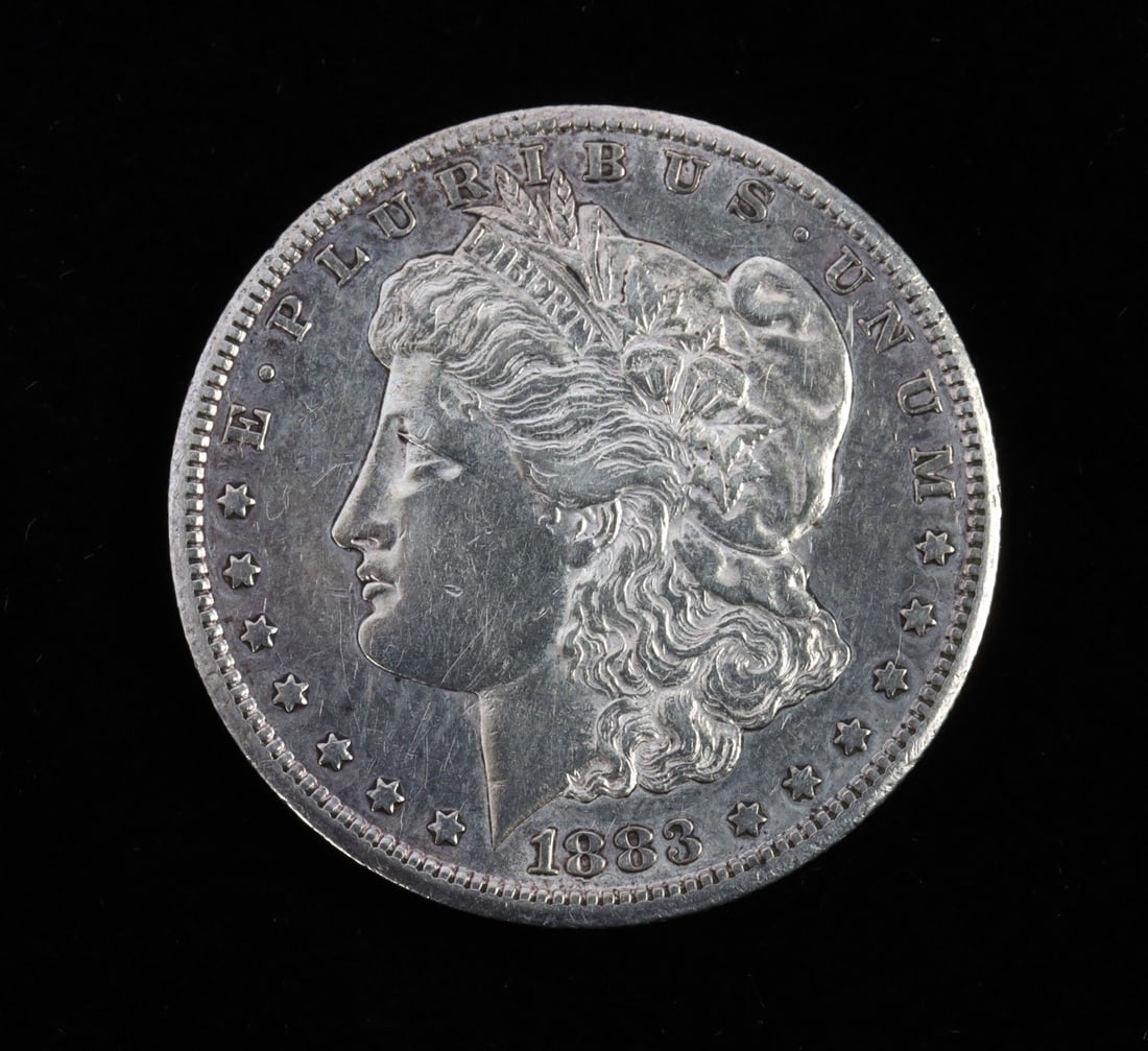 1883 CARSON CITY MORGAN SILVER DOLLAR: Extra fine. This lot reserved at melt. || Payment & shipping: Accounts without purchase history must pay via Zelle, money order, cashier's check or wire transfer. Items will ship within 10 business da