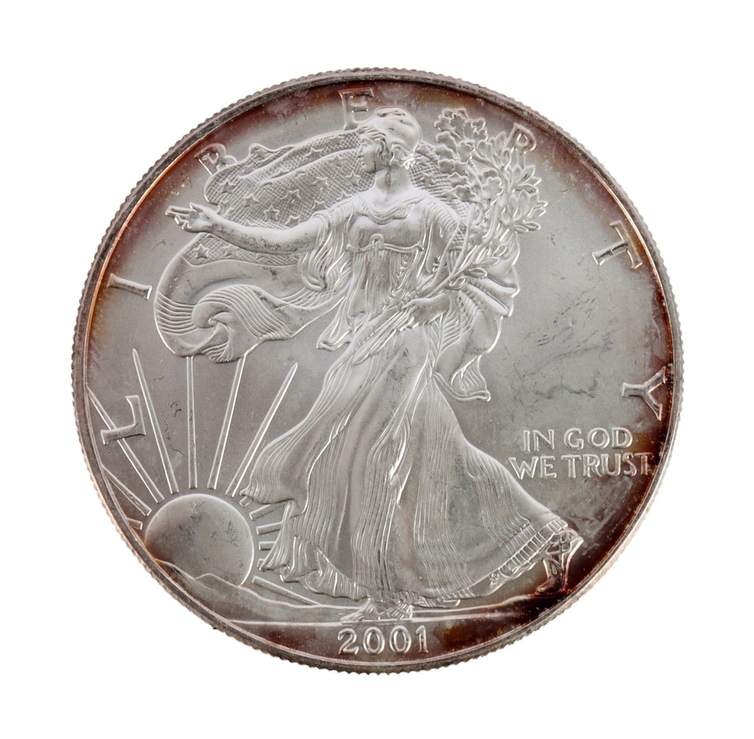 ONE US SILVER EAGLE 1 OZT .999 FINE SILVER COIN: One .999 fine silver eagle. 1 ozt. 2001. This lot reserved at melt. || Payment & Shipping: Accounts without purchase history must pay via Zelle, money order, cashier's check or wire transfer. Items