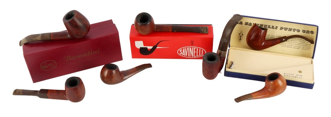 SAVINELLI ITALY VINTAGE BRIAR ESTATE PIPE LOT OF 7: Lot of seven (7) briar tobacco pipes with stems. The first pipe is marked "Barontini Classic 702 Italy." The second, "Savinelli Extra 207 Italy." The third, "Savinelli de luxe Milano 506 Italy." The f