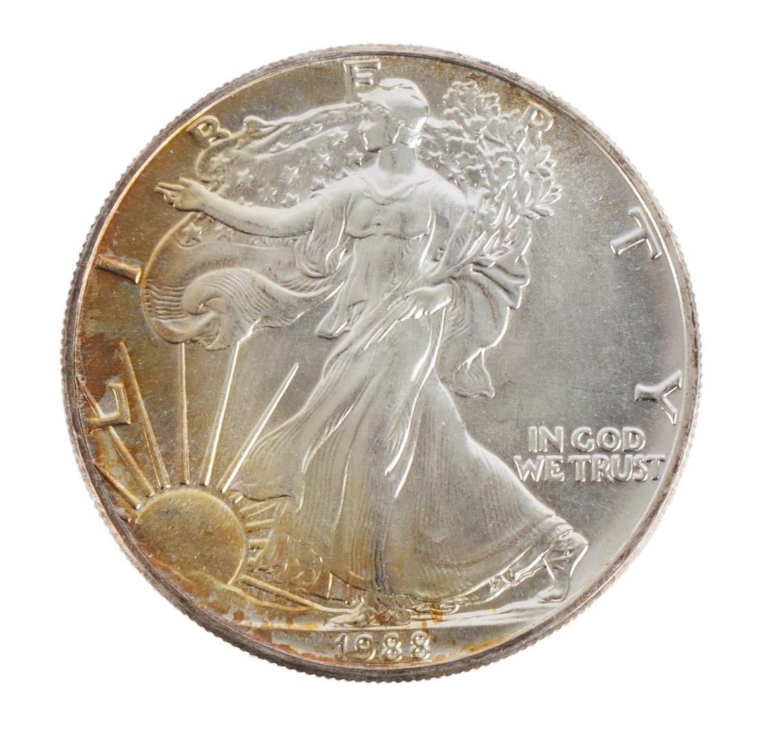 ONE US SILVER EAGLE 1 OZT .999 FINE SILVER COIN: One .999 fine silver eagle. 1 ozt. 1988. This lot reserved at melt. || Payment & Shipping: Accounts without purchase history must pay via Zelle, money order, cashier's check or wire transfer. Items wi