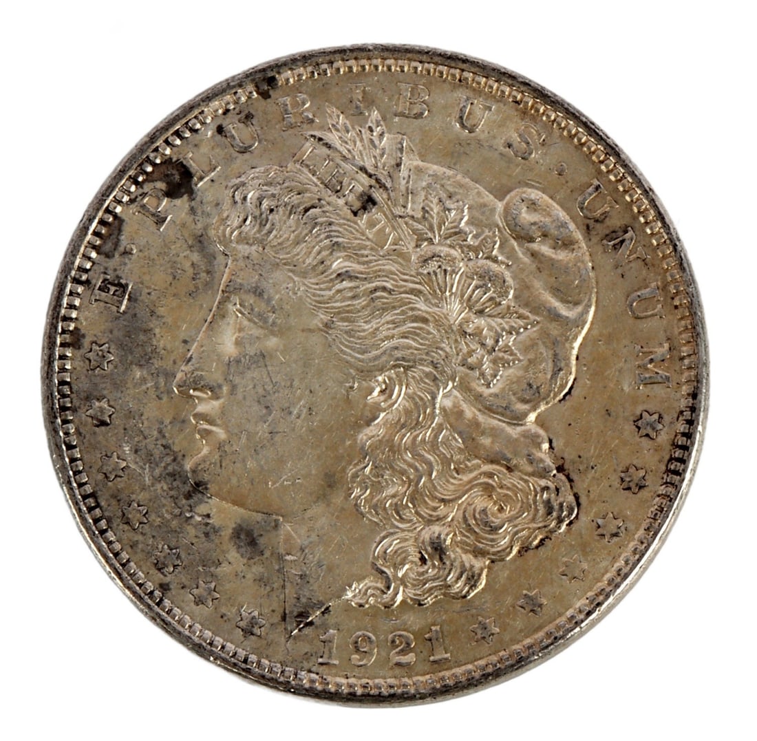 1921 US MORGAN SILVER DOLLAR COIN: 90% purity. This lot reserved at melt. || Payment & Shipping: Accounts without purchase history must pay via Zelle, money order, cashier's check or wire transfer. Items will ship within 10 business da