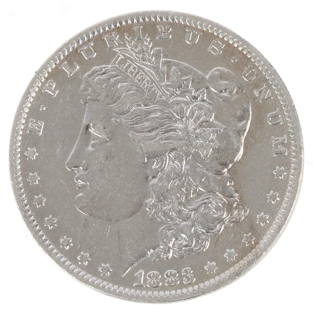 1883 O MORGAN SILVER DOLLAR COIN (1 of 3)