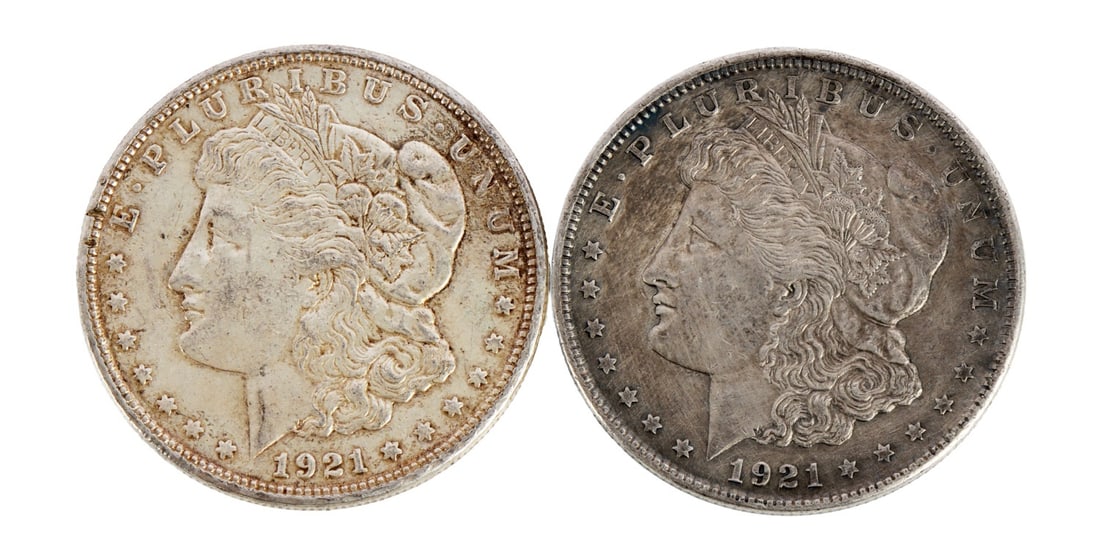 TWO 1921 US MORGAN SILVER DOLLAR COIN: 90% purity. This lot reserved at melt. || Payment & Shipping: Accounts without purchase history must pay via Zelle, money order, cashier's check or wire transfer. Items will ship within 10 business da