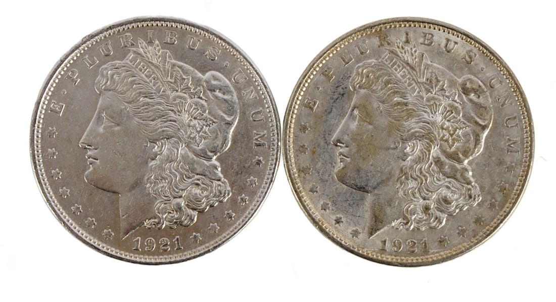 TWO 1921 US MORGAN SILVER DOLLAR COIN: 90% purity. This lot reserved at melt. || Payment & Shipping: Accounts without purchase history must pay via Zelle, money order, cashier's check or wire transfer. Items will ship within 10 business da